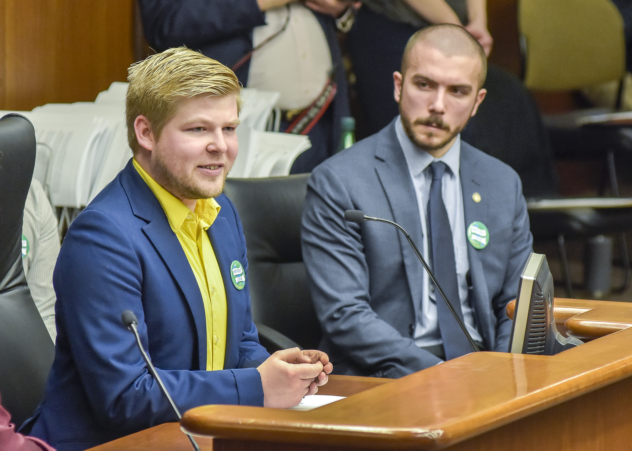 Wil Sampson-Bernstrom testifies before the House Health and Human Services Policy Committee Feb. 13 in support of a bill sponsored by Rep. Hunter Cantrell, right. Photo by Andrew VonBank